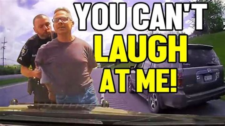 "Arrested For Laughing At A Cop"